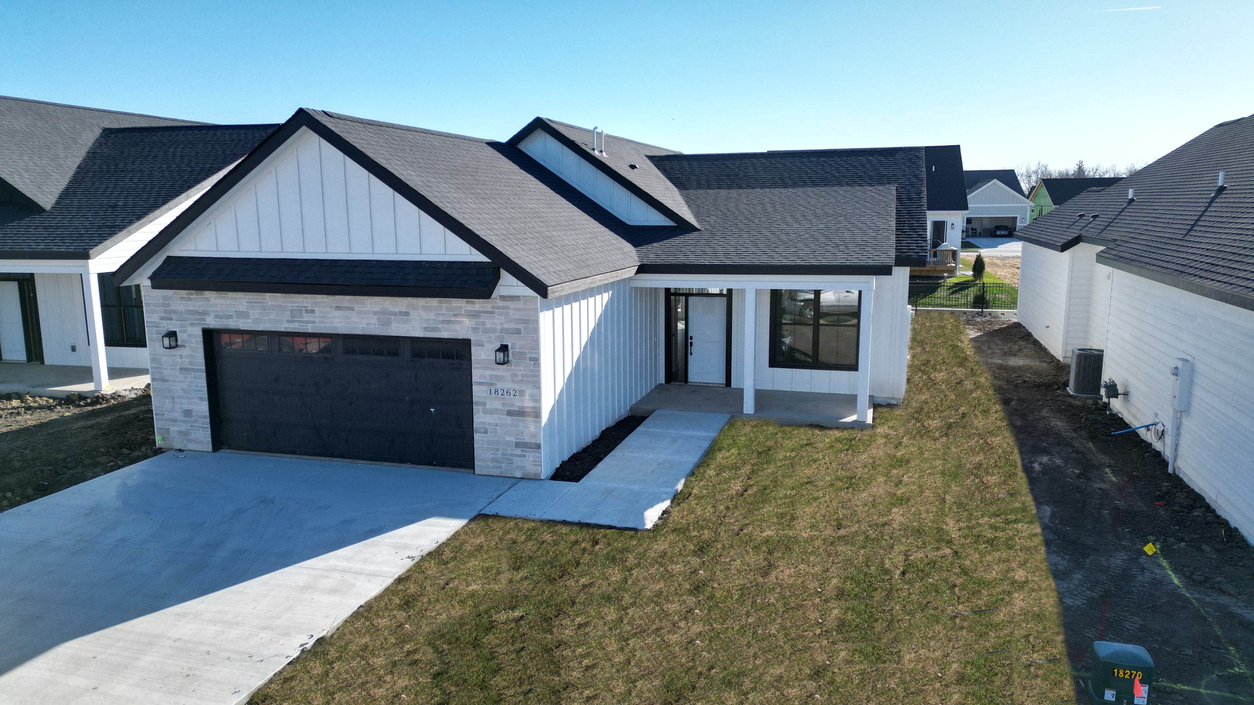 front view of a house for sale in Clive, Iowa | Amare Vita